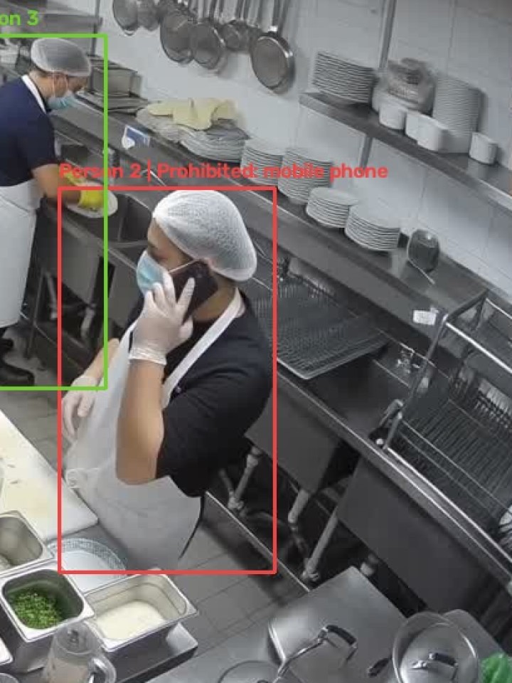 Kitchen worker flagged for using a mobile phone